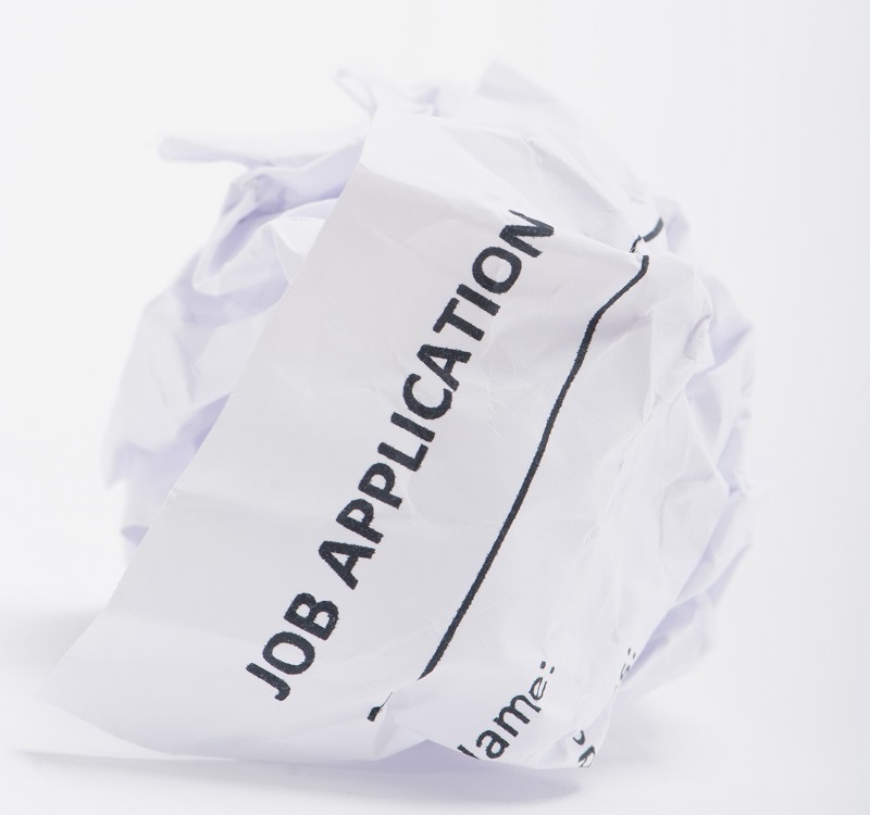 Job Application On A Crumpled Ball Of Paper